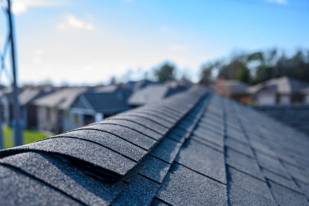Close-up of a roof covered in asphalt composite shingles.